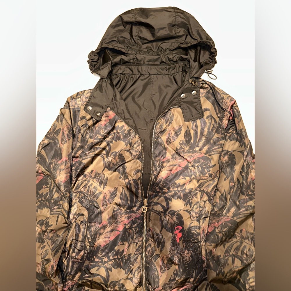 High quality wind breaker rain jacket.Black and one side a brown floral design